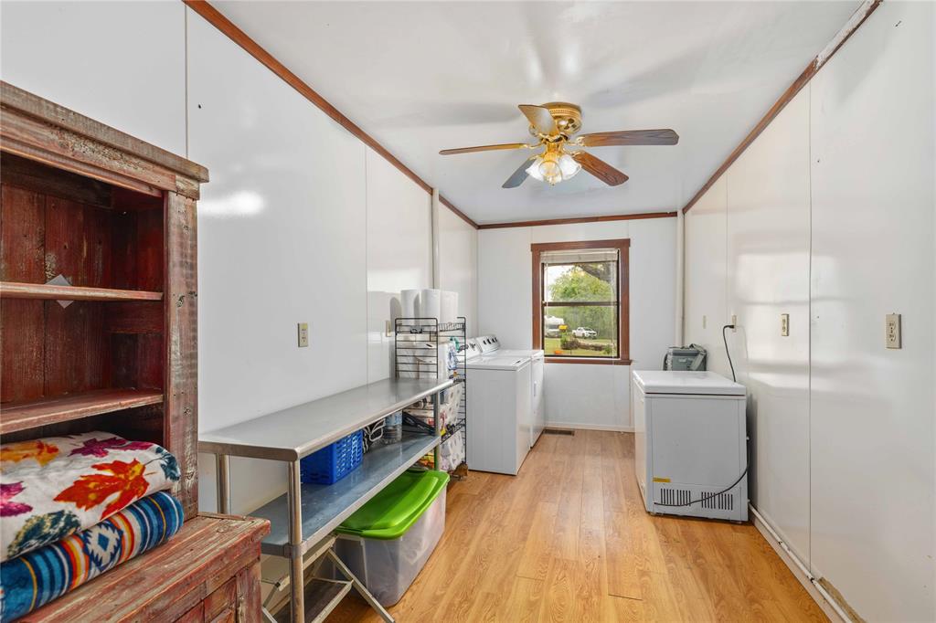 660 County Road 549 Mullin, TX 76864 - Photo 23 of 40 a very nice looking room with a window and wooden floor