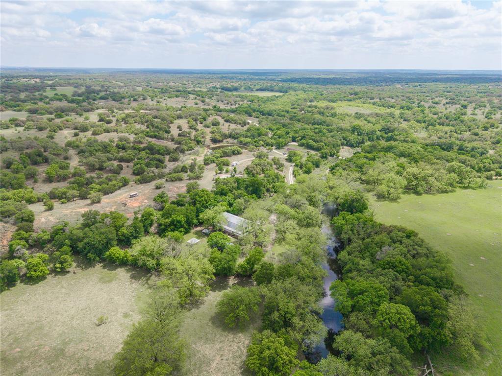 660 County Road 549 Mullin, TX 76864 - Photo 29 of 40 an aerial view of residential houses with outdoor space and trees