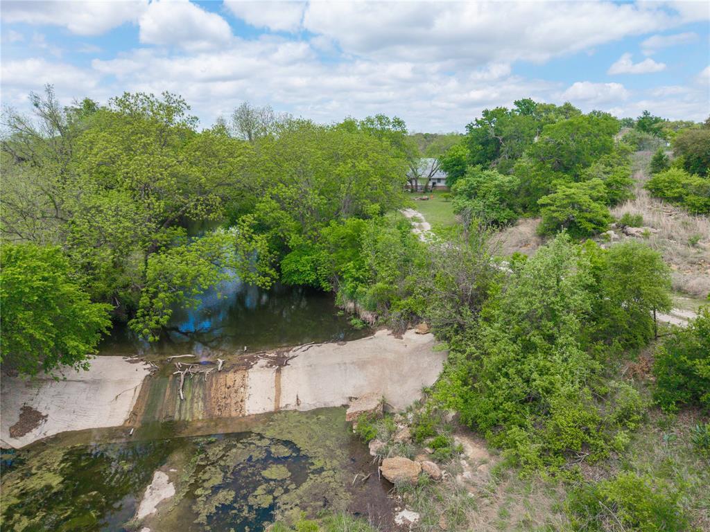 660 County Road 549 Mullin, TX 76864 - Photo 30 of 40 a view of a garden with an outdoor space