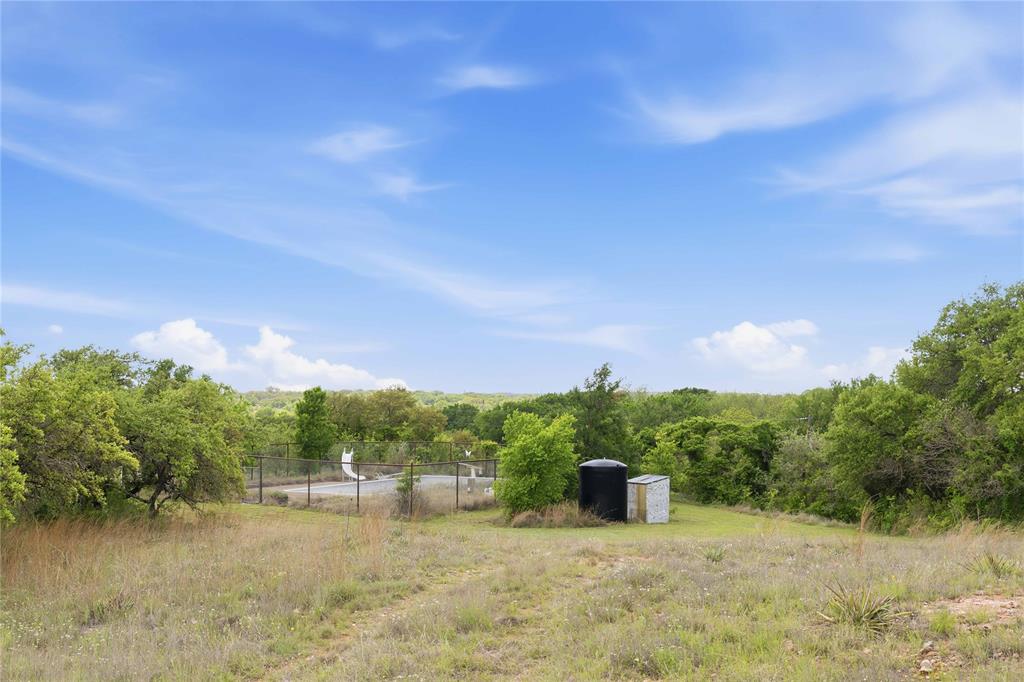 660 County Road 549 Mullin, TX 76864 - Photo 38 of 40 a view of a lake with houses in back