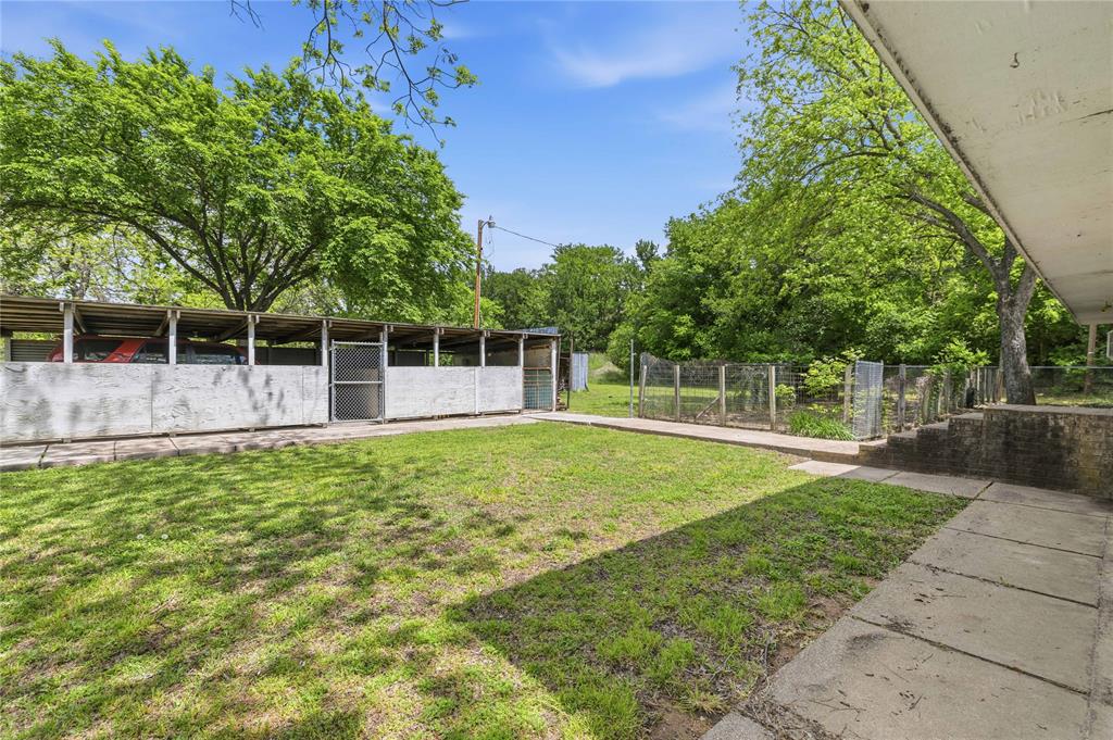 660 County Road 549 Mullin, TX 76864 - Photo 7 of 40 a backyard of a house with lots of green space