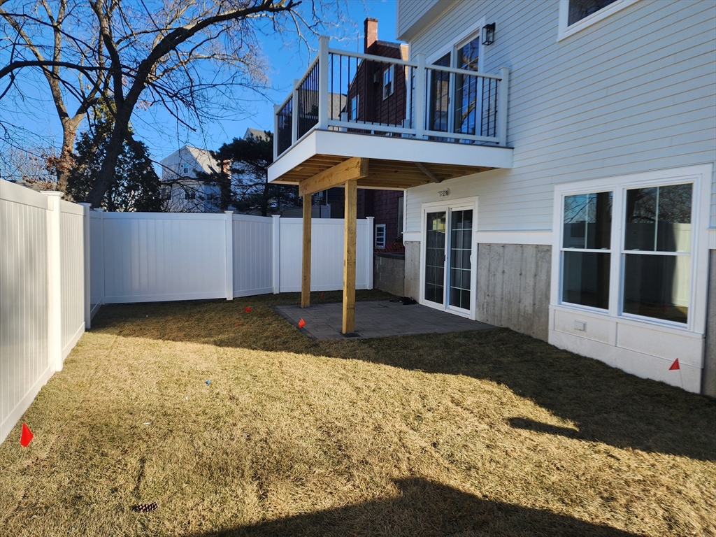 63 Montclair Avenue Waltham, MA 02451 - Photo 17 of 23 a front view of a house with garden