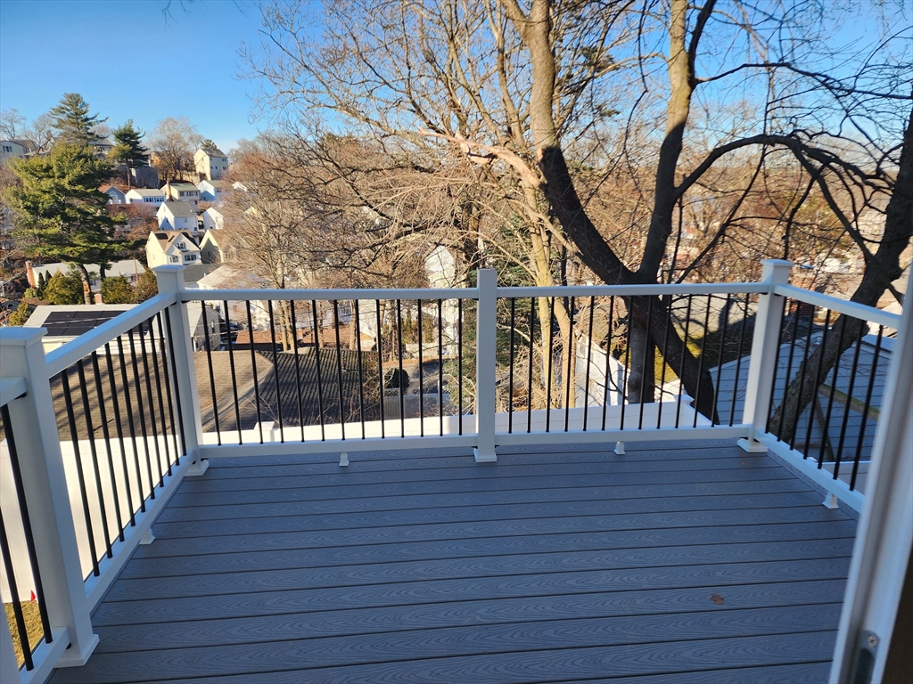 63 Montclair Avenue Waltham, MA 02451 - Photo 23 of 23 a view of entryway with wooden floor