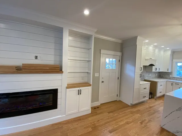 a view of a kitchen with a sink and a stove