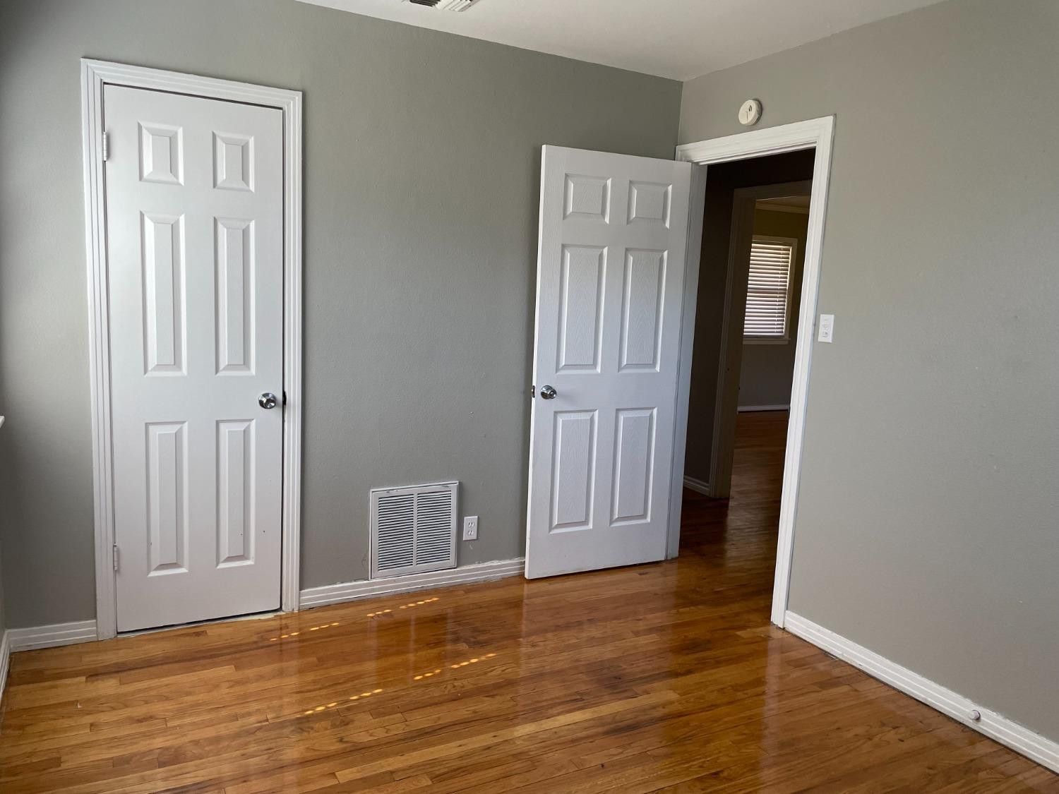 6501 Avenue T Lubbock, TX 79412 - Photo 15 of 20 wooden floor and window in a room