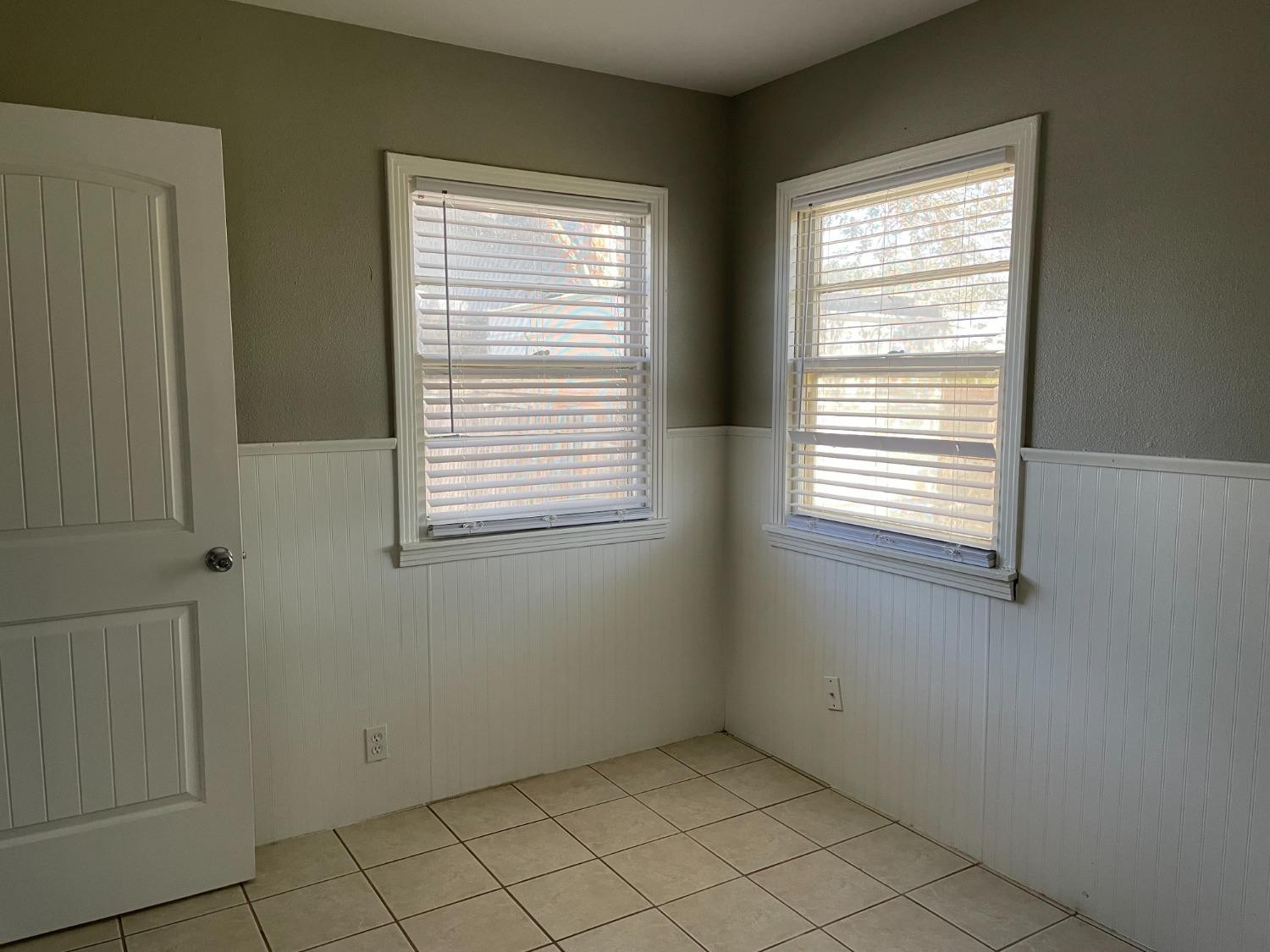 6501 Avenue T Lubbock, TX 79412 - Photo 9 of 20 a view of an empty room with a window