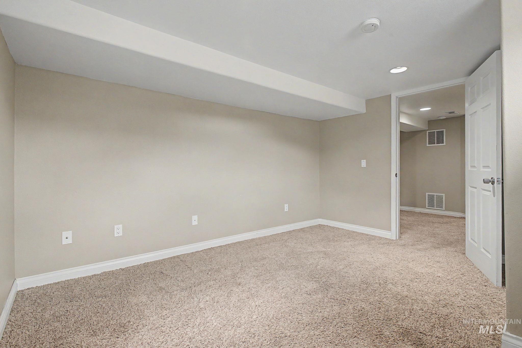 3314 6th Street Lewiston, ID 83501 - Photo 33 of 50 Carpeted room featuring neutral wall tones and white baseboards
