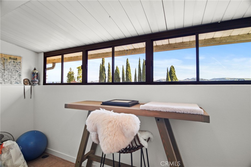 279 Tempus Circle Arroyo Grande, CA 93420 - Photo 18 of 38 a view of a dining room with furniture and window
