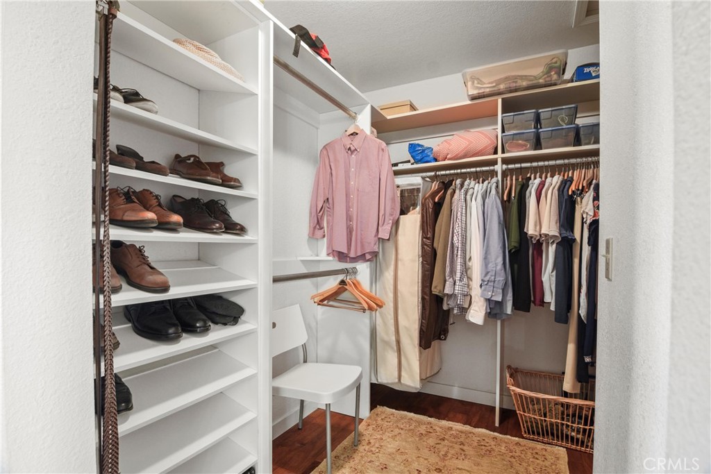 279 Tempus Circle Arroyo Grande, CA 93420 - Photo 19 of 38 a view of walk in closet with clothes and shoes