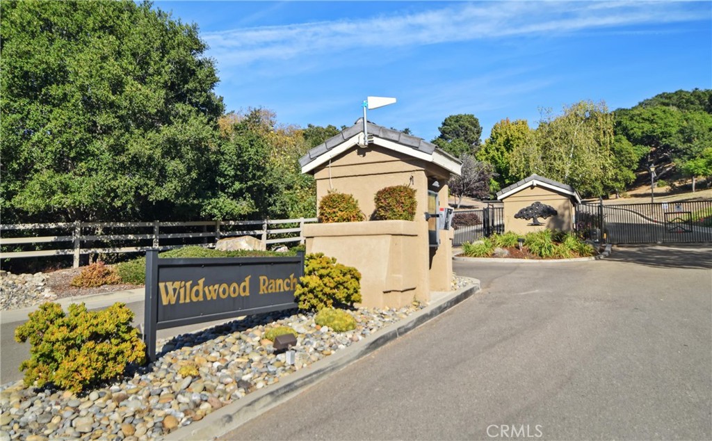 279 Tempus Circle Arroyo Grande, CA 93420 - Photo 35 of 38 a view of a street with benches in the background