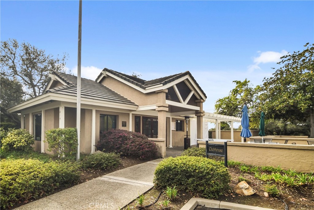 279 Tempus Circle Arroyo Grande, CA 93420 - Photo 36 of 38 a front view of a house with a yard