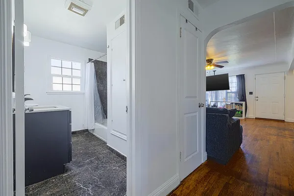 a view of a kitchen and a window