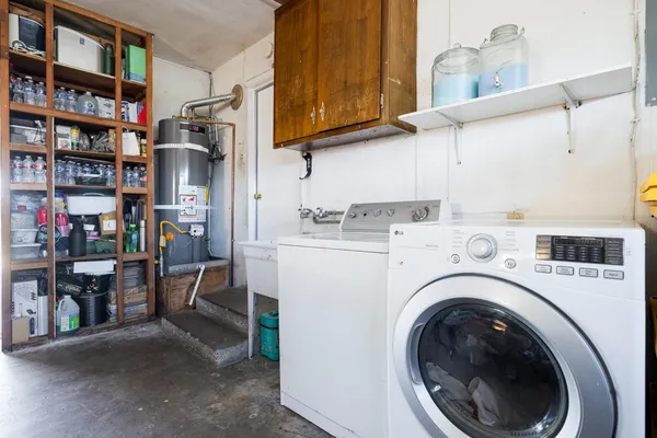 a utility room with dryer and washer