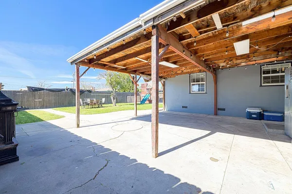 a view of a backyard of a house