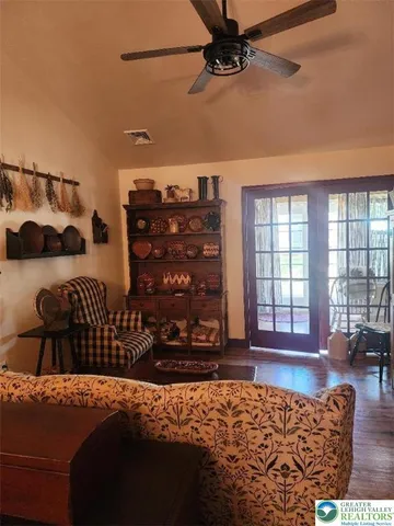 a bedroom with a bed and cabinets