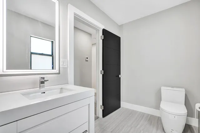 a bathroom with a sink a shower and a tub