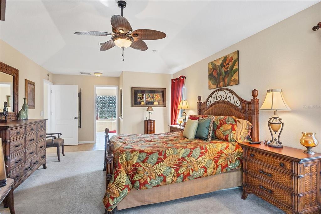 14091 Peekskill Avenue Port Charlotte, FL 33981 - Photo 20 of 53 a bedroom with a bed and wooden floor