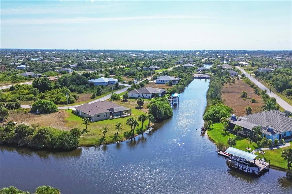 14091 Peekskill Avenue Port Charlotte, FL 33981 - Photo 41 of 53 an aerial view of a houses with a lake view