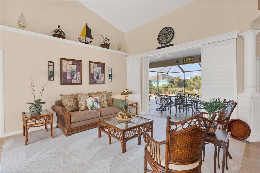 14091 Peekskill Avenue Port Charlotte, FL 33981 - Photo 7 of 53 a living room with furniture and a large window