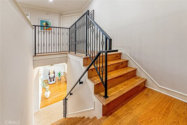 a spacious bathroom with a granite countertop sink a mirror and a bathtub