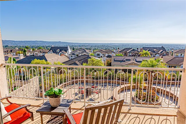 a bedroom with a bed wooden floor and a window