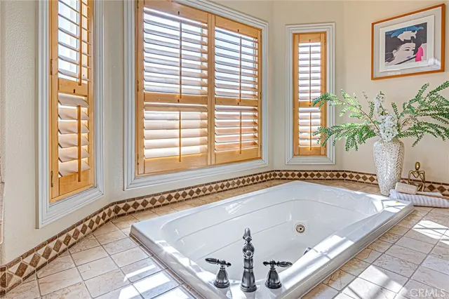 a bathroom with a shower and a toilet