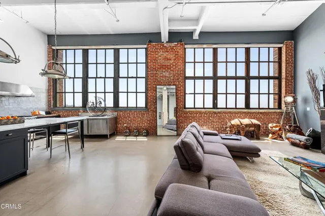 a bed room with furniture and a window