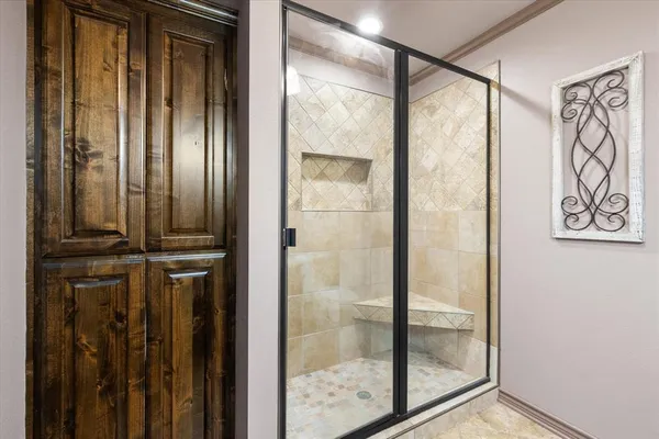 a view of a bathroom with a glass door