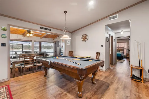 a room with lots of table and chairs