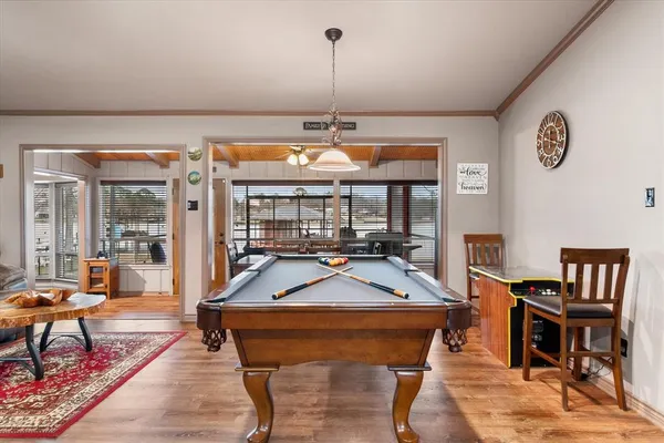 a room with lots of tables and chairs