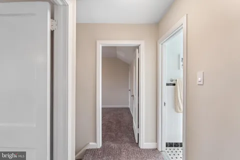 a view of a livingroom from a hallway