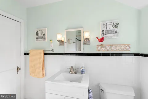 a bathroom with a bathtub and a sink