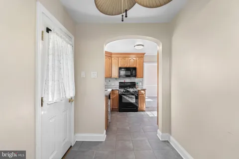 a view of a kitchen with a sink