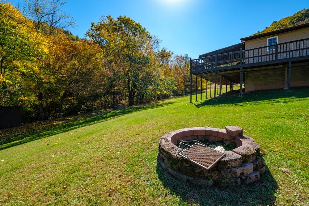 23215 Bennett Run Road Bergton, VA 22811 - Photo 17 of 19 a view of a house with backyard tub and trees