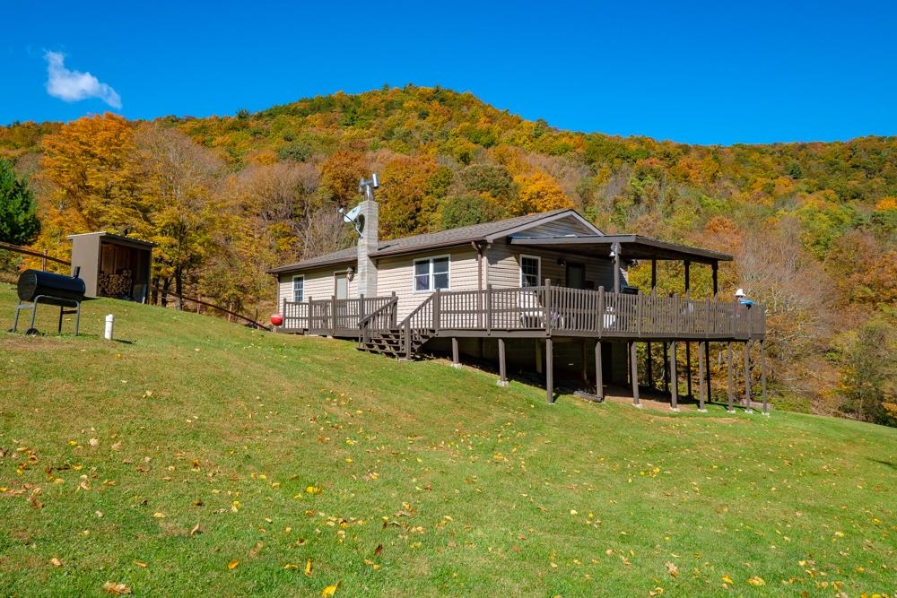 23215 Bennett Run Road Bergton, VA 22811 - Photo 2 of 19 a front view of a house with a yard