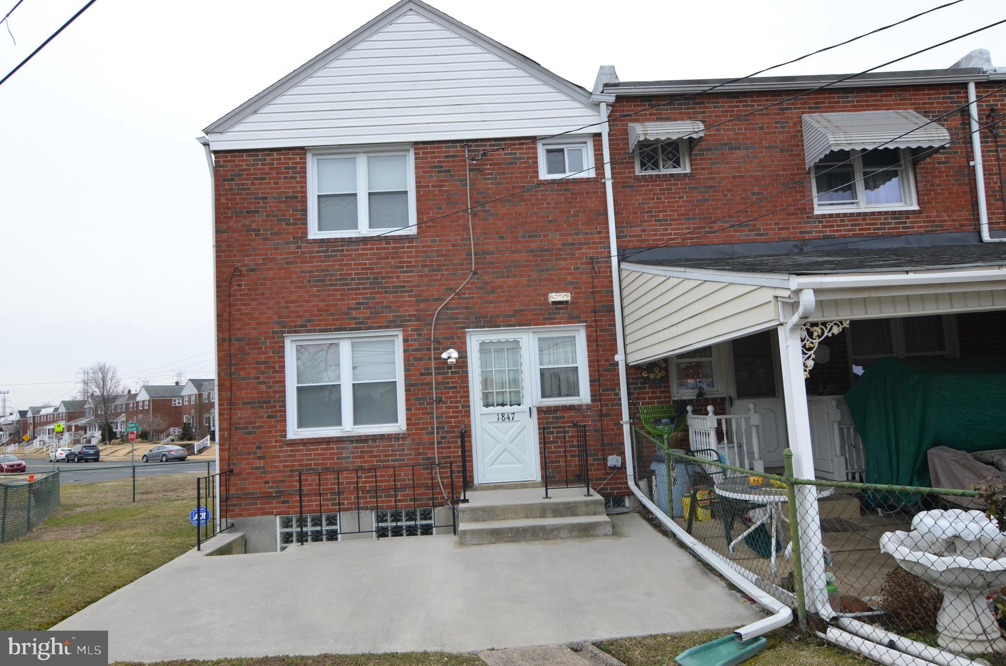 1847 Church Road Dundalk, MD 21222 - Photo 2 of 20 Rear patio and parking pad at alley