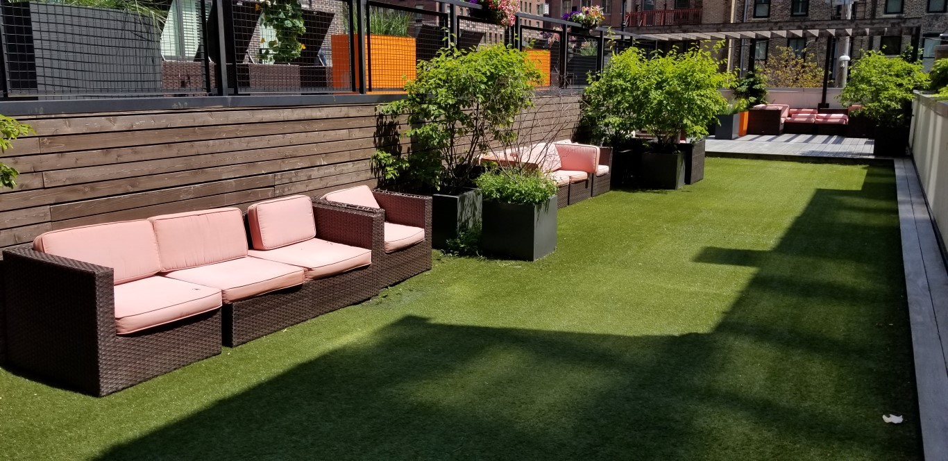 21 West Goethe Street, Unit 7C Chicago, IL 60610 - Photo 21 of 24 a view of a patio with plants and a fountain
