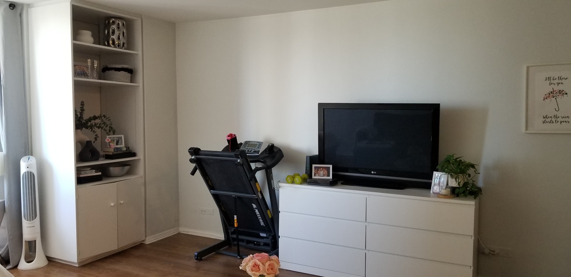 21 West Goethe Street, Unit 7C Chicago, IL 60610 - Photo 5 of 24 a room with furniture and a flat screen tv