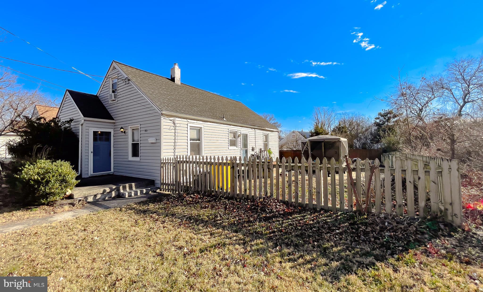 31 Governor's Gate Lane Linthicum, MD 21090 - Photo 3 of 34 a front view of a house with a yard