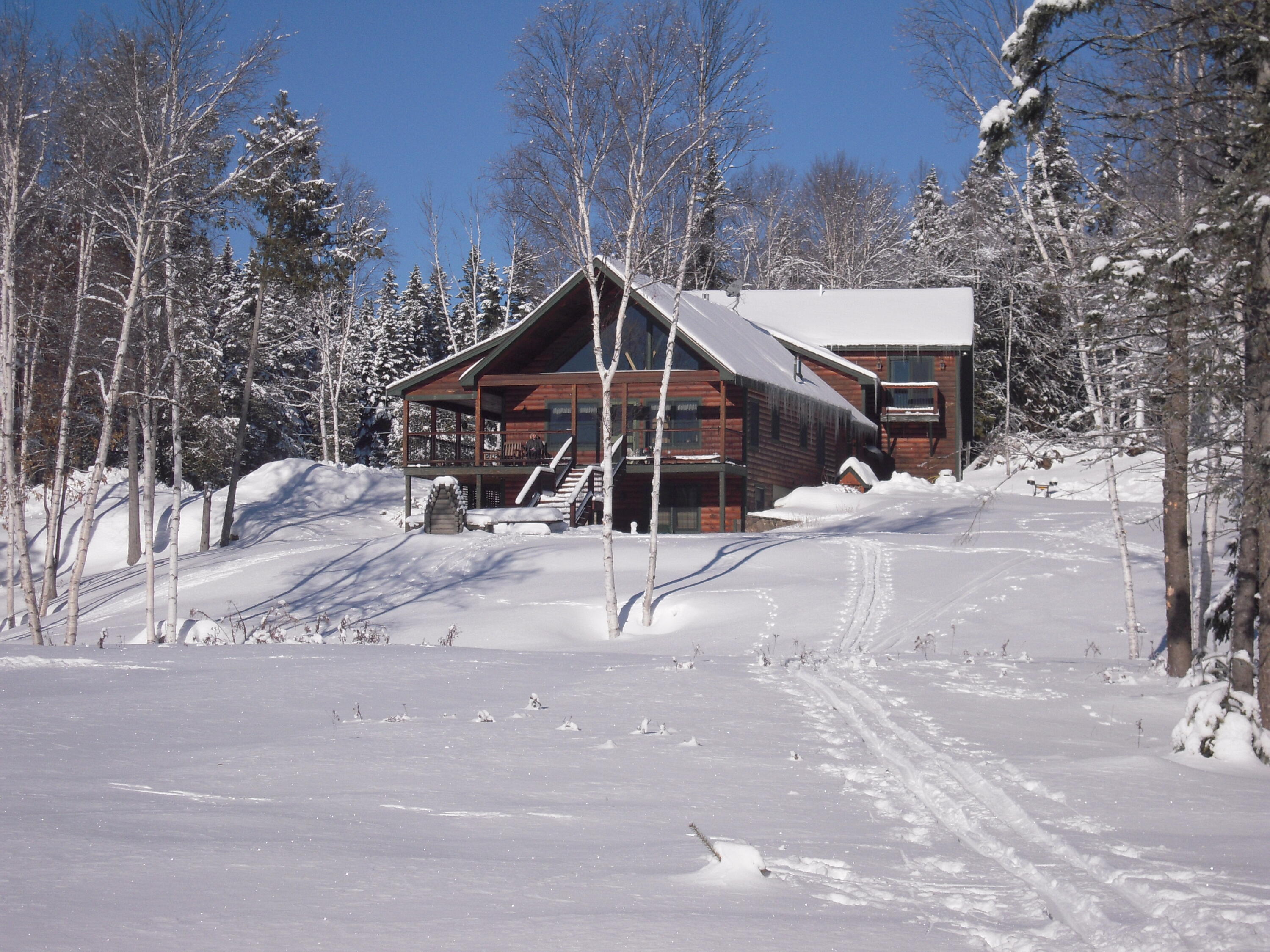 28 Squire Drive Rangeley, ME 04970 - Photo 3 of 31 A-House-Winter