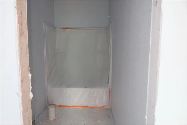 a bathroom with a bathtub