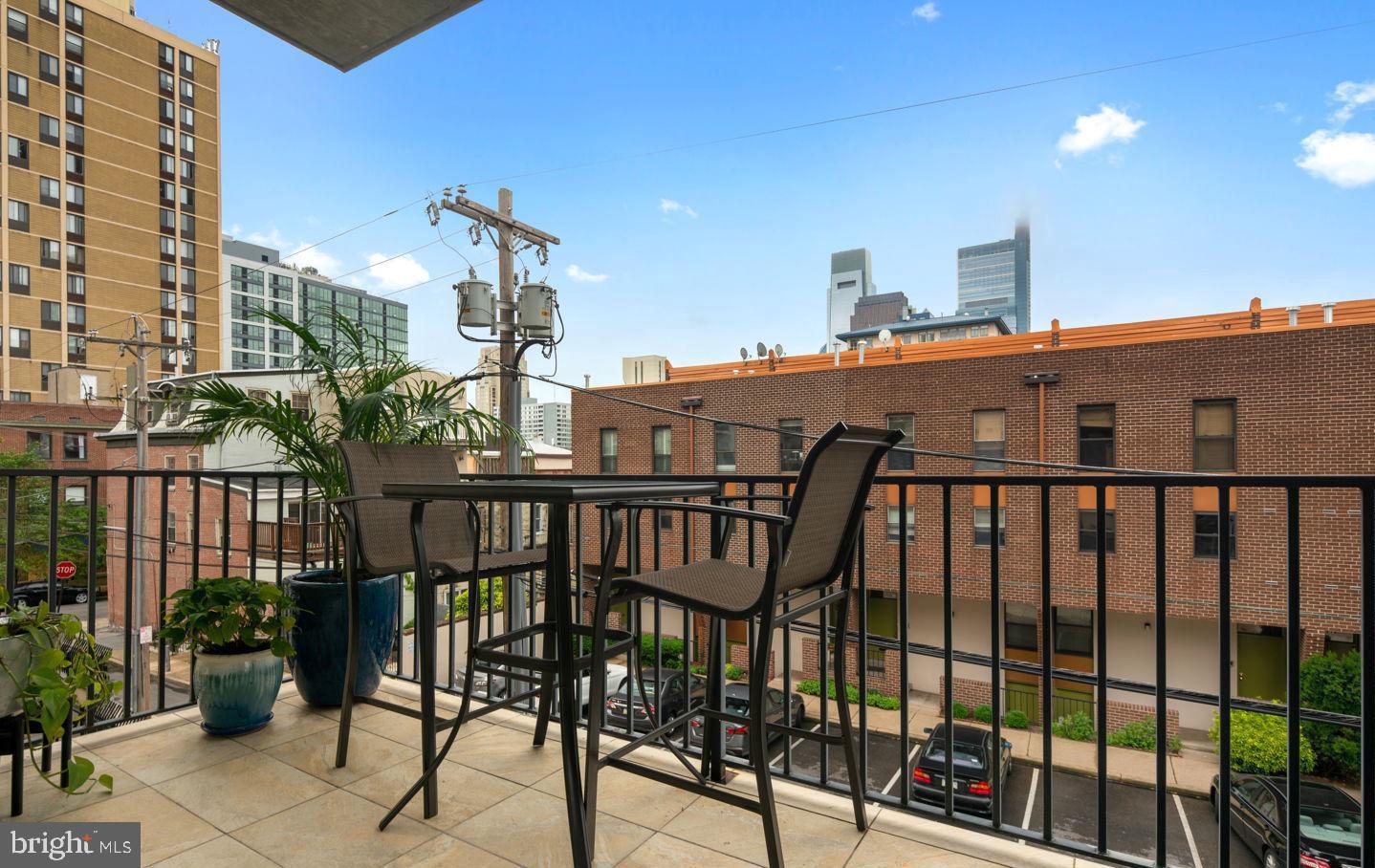 1910 Spring Garden Street, Unit 2 Philadelphia, PA 19130 - Photo 11 of 36 a view of a balcony with furniture