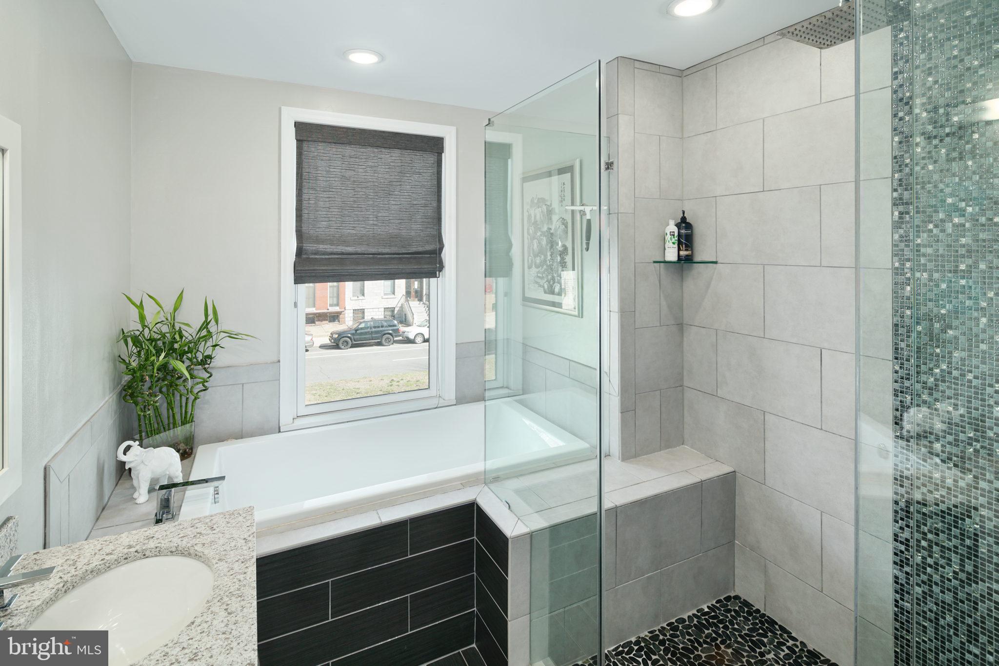 1910 Spring Garden Street, Unit 2 Philadelphia, PA 19130 - Photo 24 of 36 a bathroom with a tub shower and sink