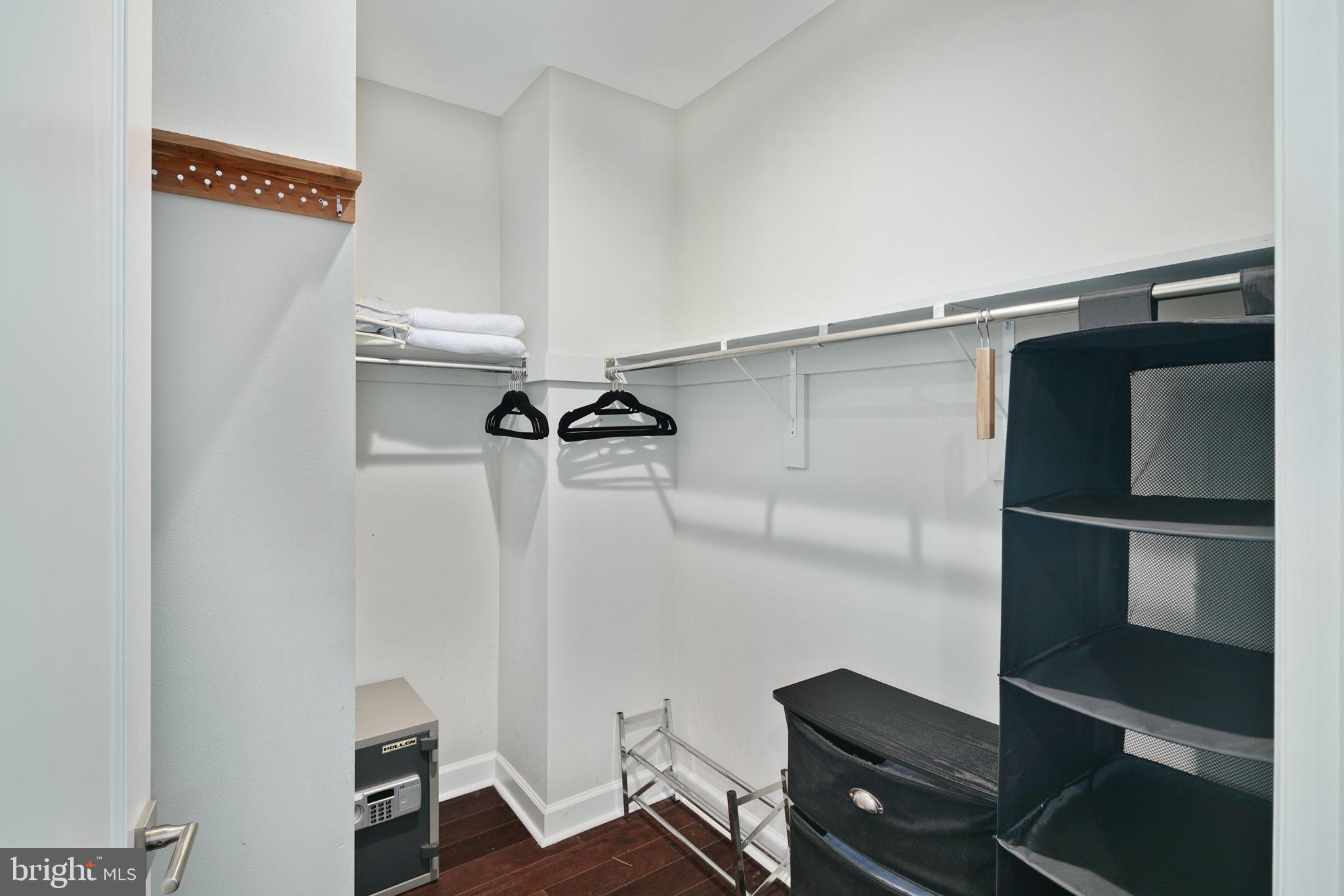1910 Spring Garden Street, Unit 2 Philadelphia, PA 19130 - Photo 26 of 36 a view of walk in closet with clothes and shoes