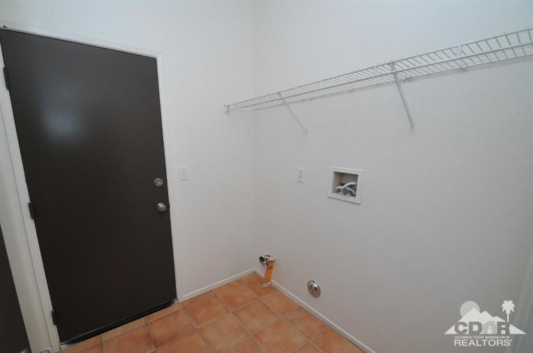 47534 Stampede Trail Indio, CA 92201 - Photo 14 of 17 a room that has a closet in it