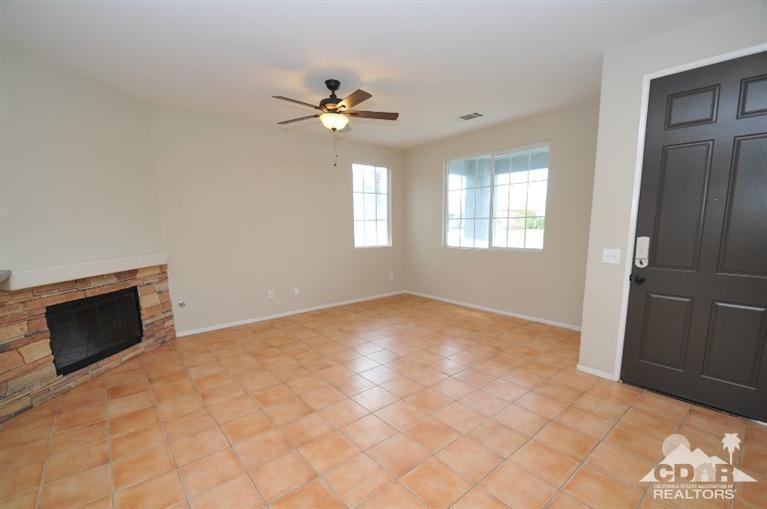 47534 Stampede Trail Indio, CA 92201 - Photo 2 of 17 a view of an empty room with a window