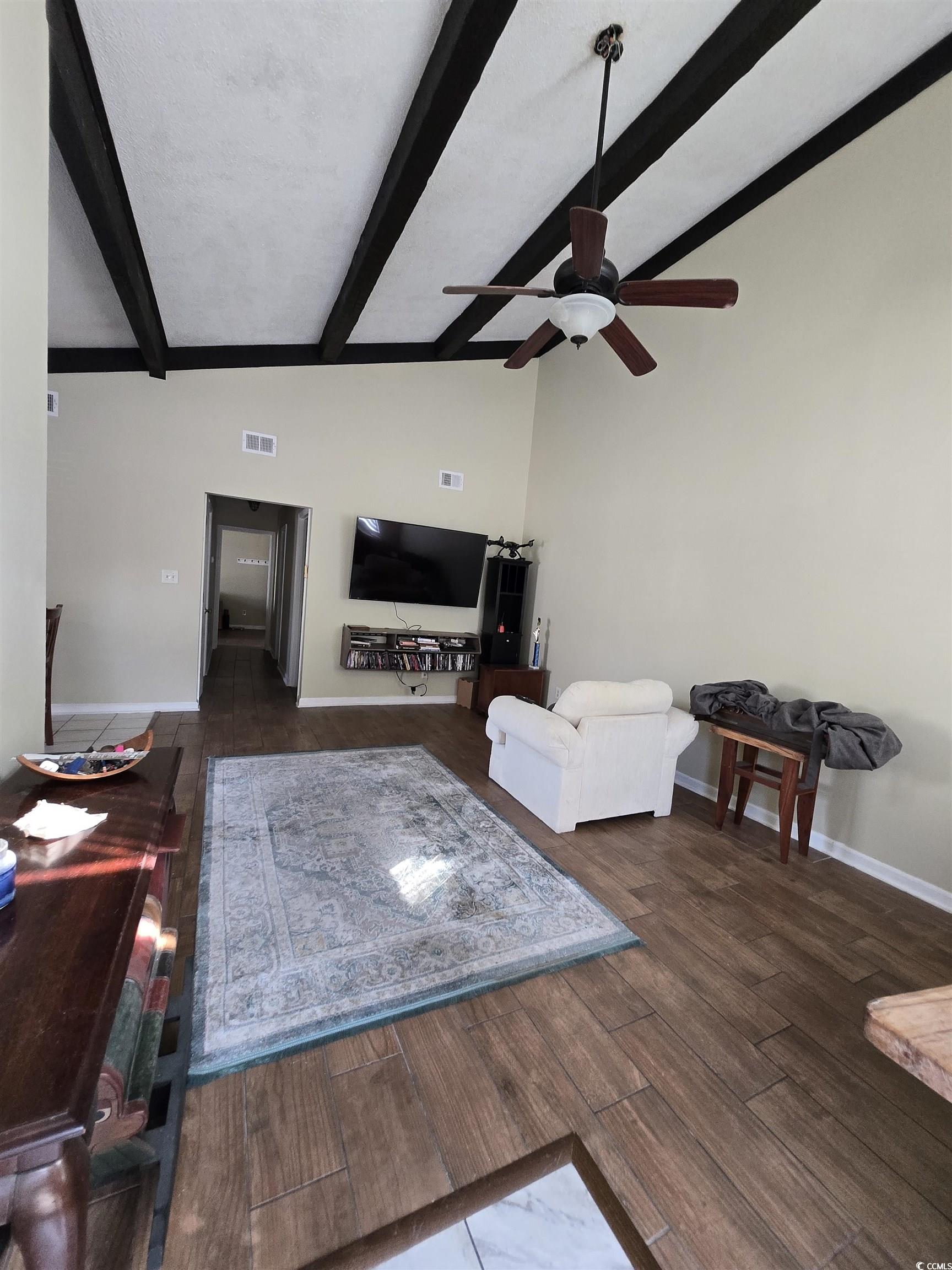 604 35th Avenue North, Unit A Myrtle Beach, SC 29577 - Photo 2 of 10 Living room with dark wood-style floors and a ceiling fan