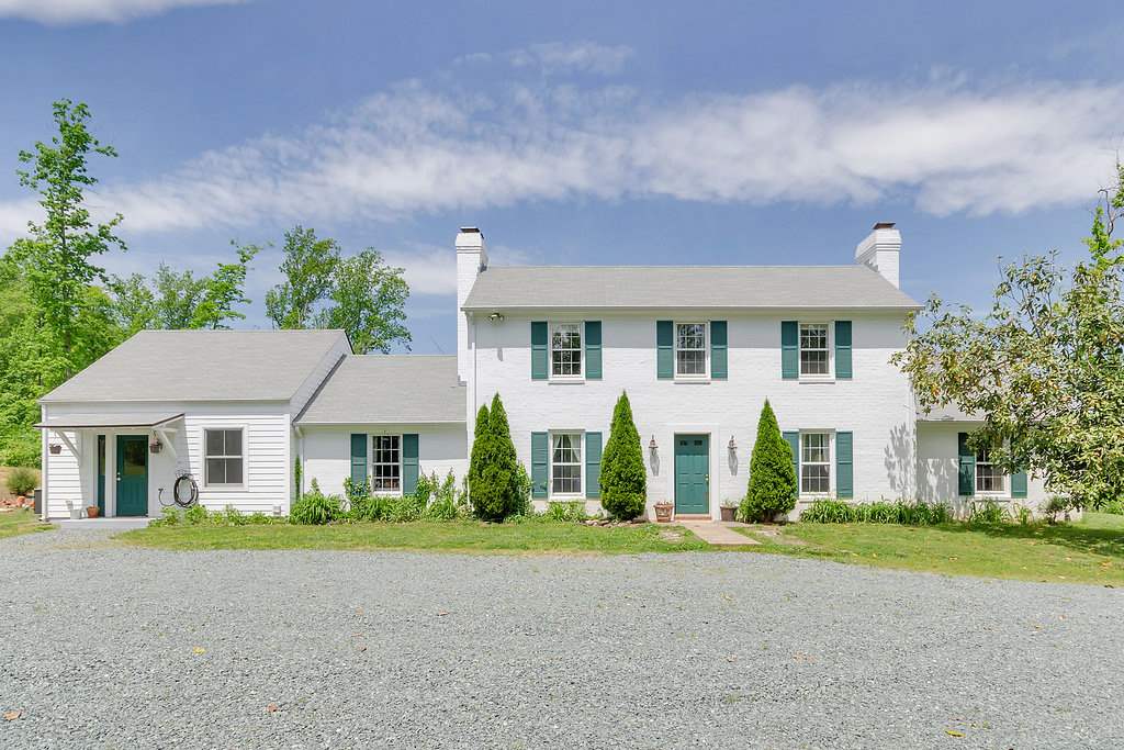 3354 Free Union Road Charlottesville, VA 22901 - Photo 1 of 45 front view of house with a yard