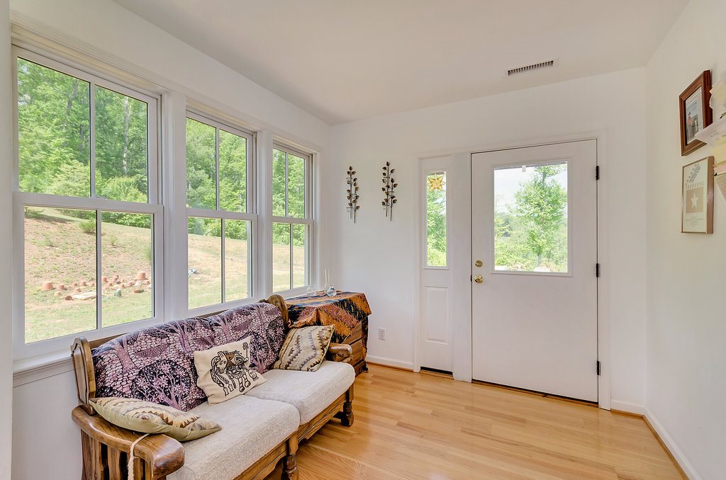 3354 Free Union Road Charlottesville, VA 22901 - Photo 13 of 45 a living room with furniture and a large window