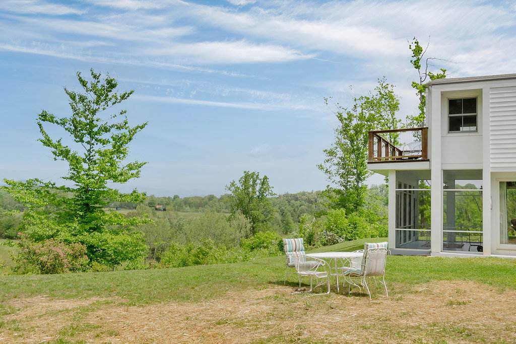 3354 Free Union Road Charlottesville, VA 22901 - Photo 30 of 45 a view of a chair and table in the garden
